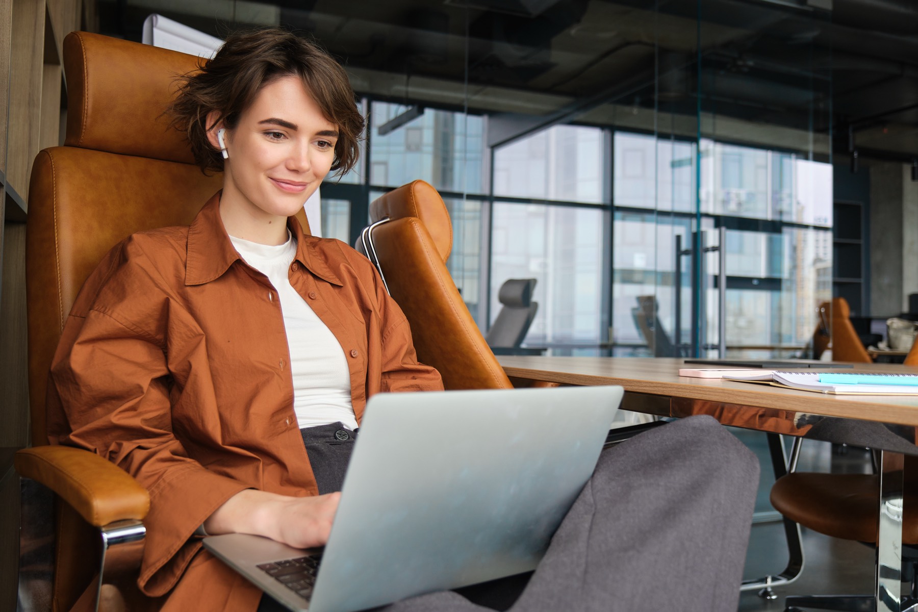 Confident professional woman working in her office