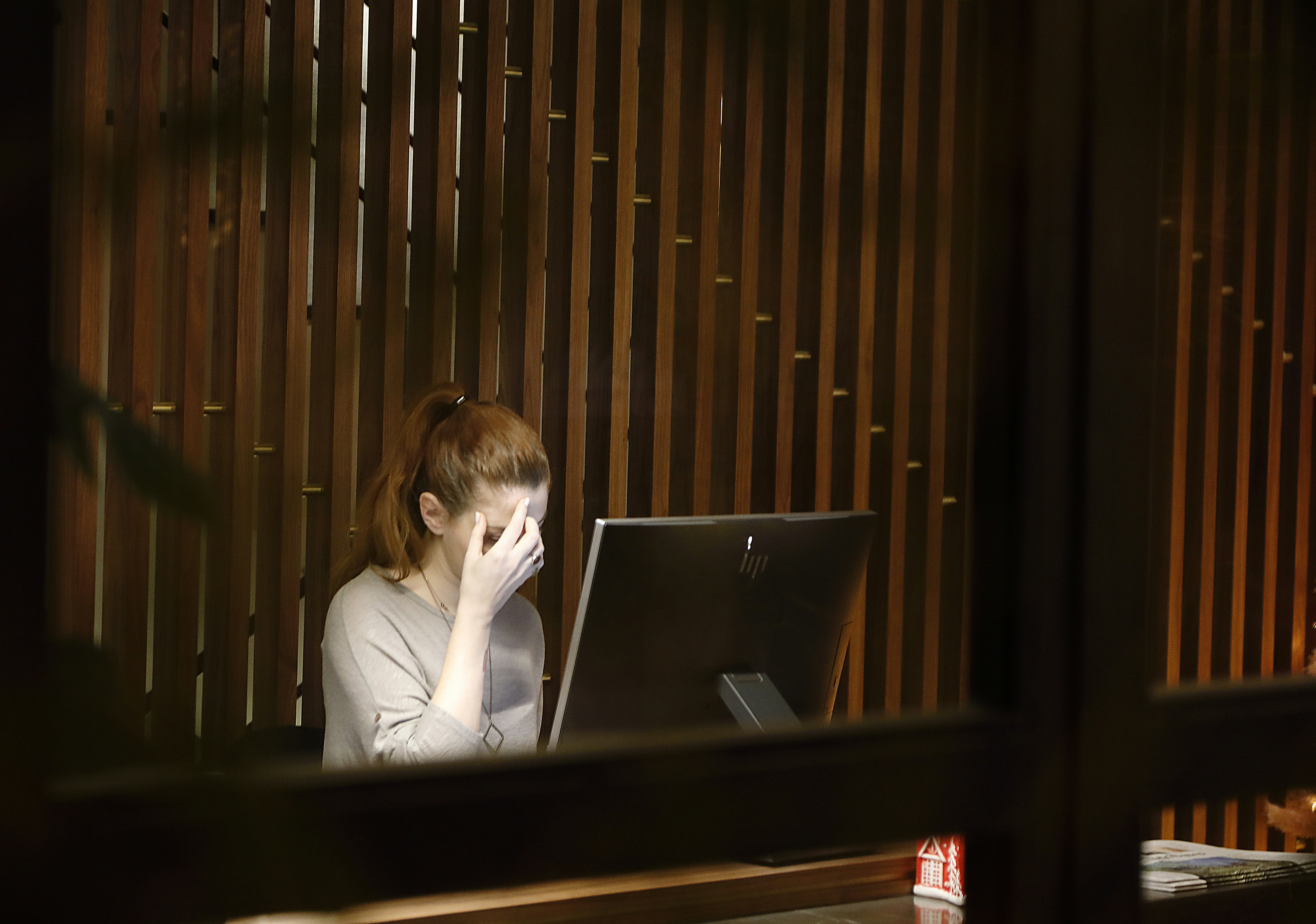 A woman in a quiet moment of reflection